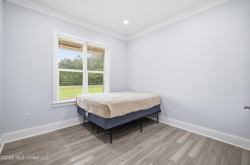 Nearly Brand New on 7.9 Acres! Completed in late 2024, this - photo 25
