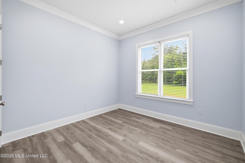 Nearly Brand New on 7.9 Acres! Completed in late 2024, this - photo 28
