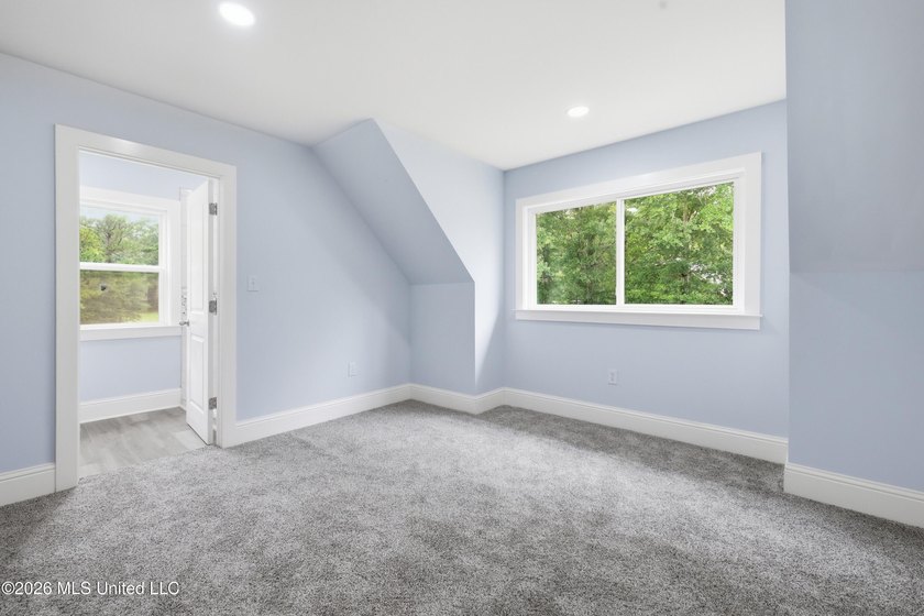 Nearly Brand New on 7.9 Acres! Completed in late 2024, this - photo 31