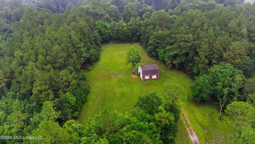Nearly Brand New on 7.9 Acres! Completed in late 2024, this - photo 39