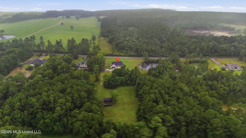 Nearly Brand New on 7.9 Acres! Completed in late 2024, this - photo 42