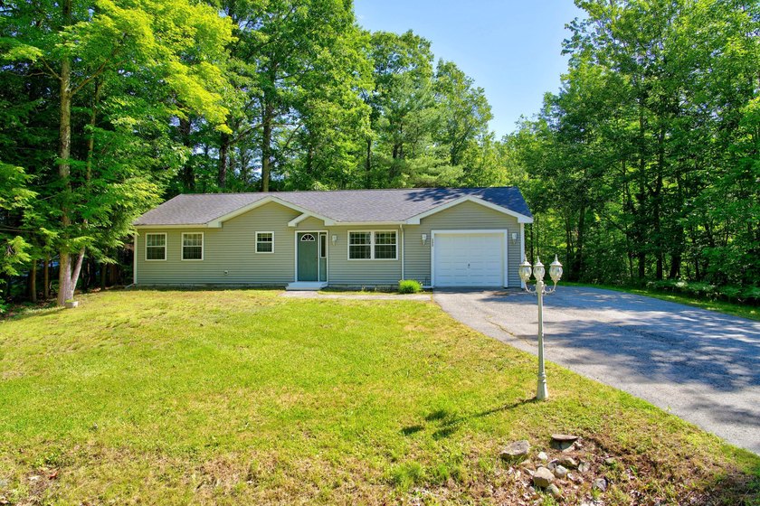 Quality-built and low maintenance, this charming two-bedroom - photo 3