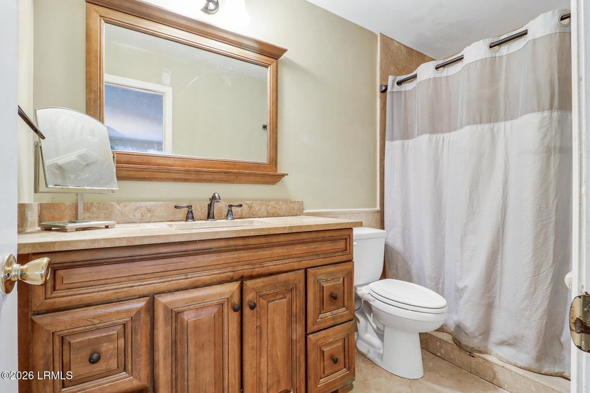 Nestled on 1.48 private acres in the exclusive waterfront - photo 21