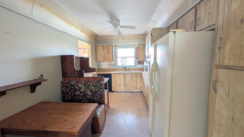 Welcome to this spacious 2-bedroom, 2-bath corner condo located - photo 5