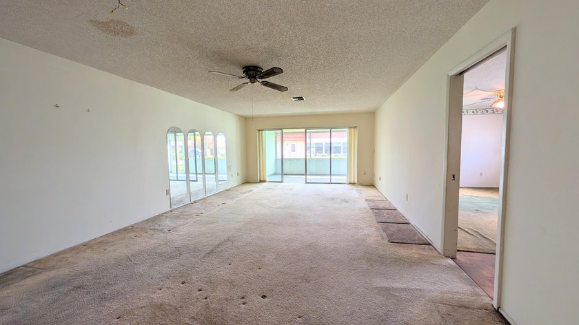 Welcome to this spacious 2-bedroom, 2-bath corner condo located - photo 7