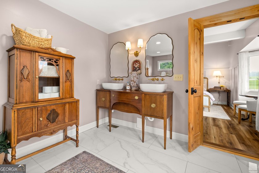 A beautifully remodeled farmhouse situated on 13.39 private - photo 26