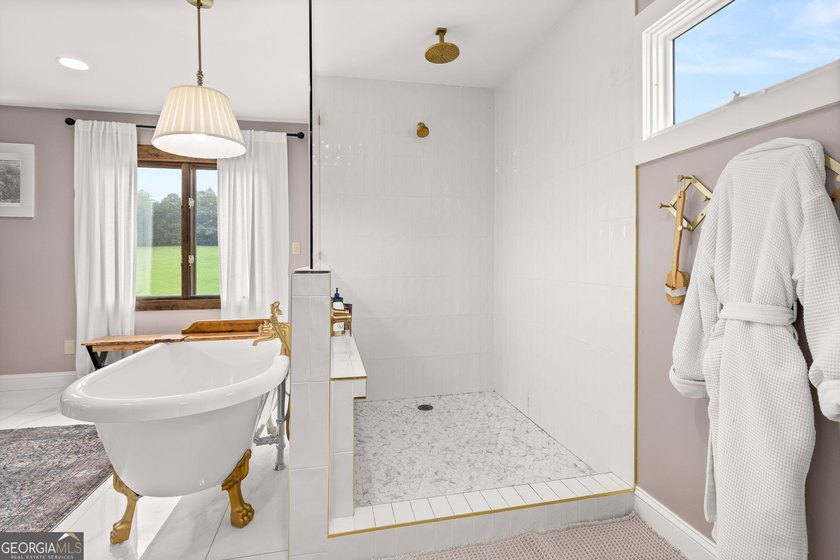 A beautifully remodeled farmhouse situated on 13.39 private - photo 28