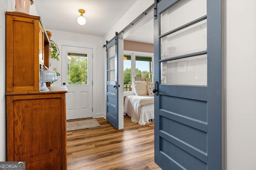 A beautifully remodeled farmhouse situated on 13.39 private - photo 30
