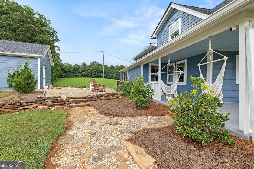 A beautifully remodeled farmhouse situated on 13.39 private - photo 45