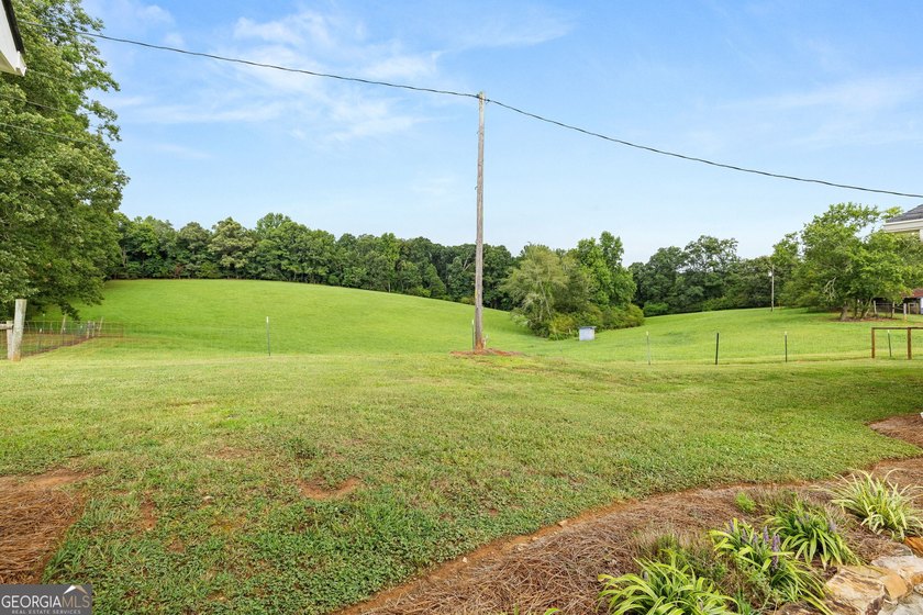 A beautifully remodeled farmhouse situated on 13.39 private - photo 47