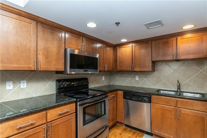 Experience urban living at its finest in this stunning 2 - - photo 19
