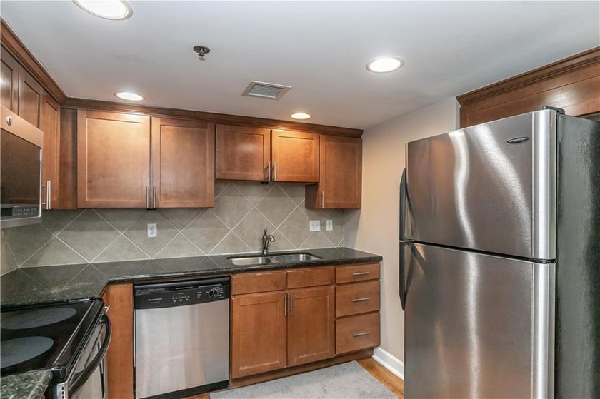 Experience urban living at its finest in this stunning 2 - - photo 20