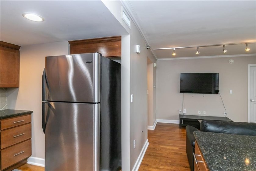 Experience urban living at its finest in this stunning 2 - - photo 21