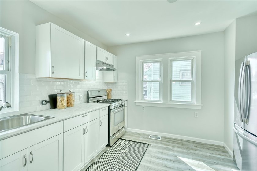 Step into modern comfort in this beautifully updated colonial - photo 2
