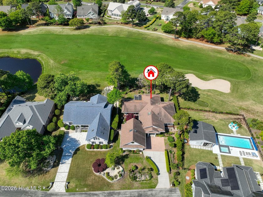 Positioned along the golf course in St. James Plantation, this - photo 2