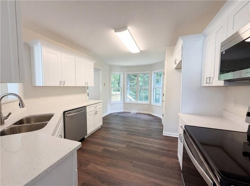 Meet 6158 Autumn View Cv NW, a residence featuring fresh - photo 2