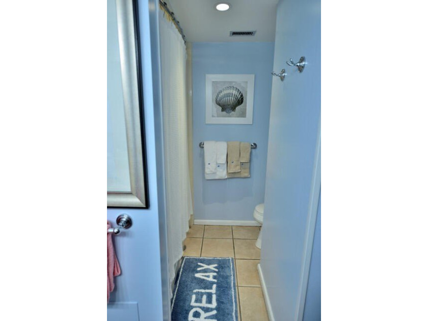 Jetty East is a Gulf front Gated 6-story midrise with under - photo 15