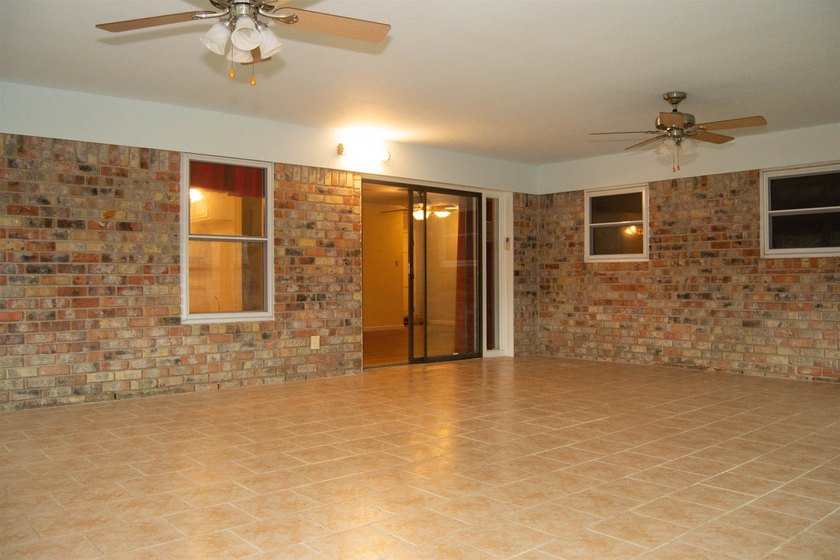 This 3/2/2 home offers incredible potential and plenty of space - photo 4