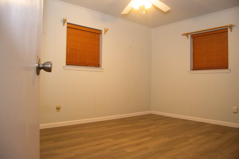This 3/2/2 home offers incredible potential and plenty of space - photo 9