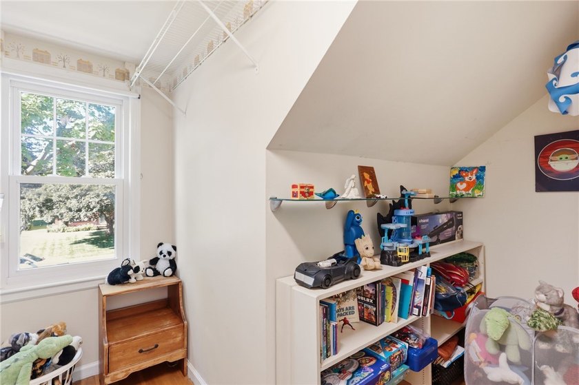Welcome to this charming 4-bedroom 1.5 bath just yards away from - photo 12