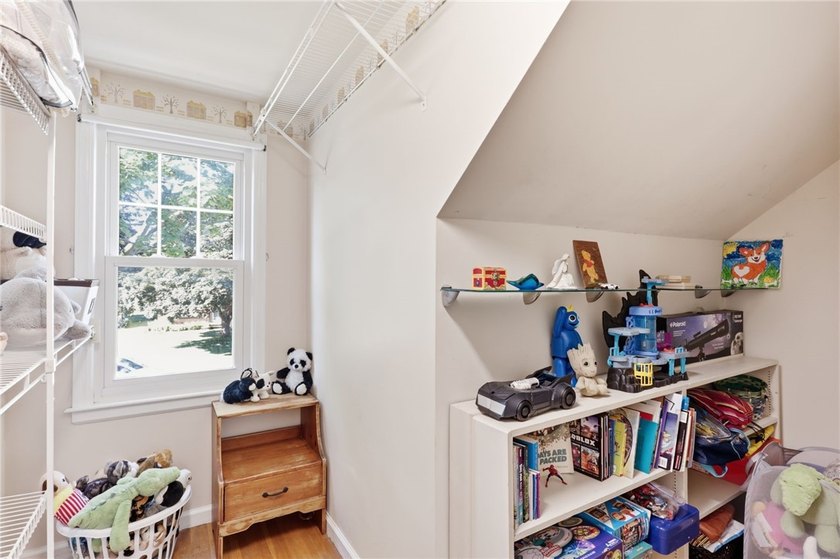 Welcome to this charming 4-bedroom 1.5 bath just yards away from - photo 13