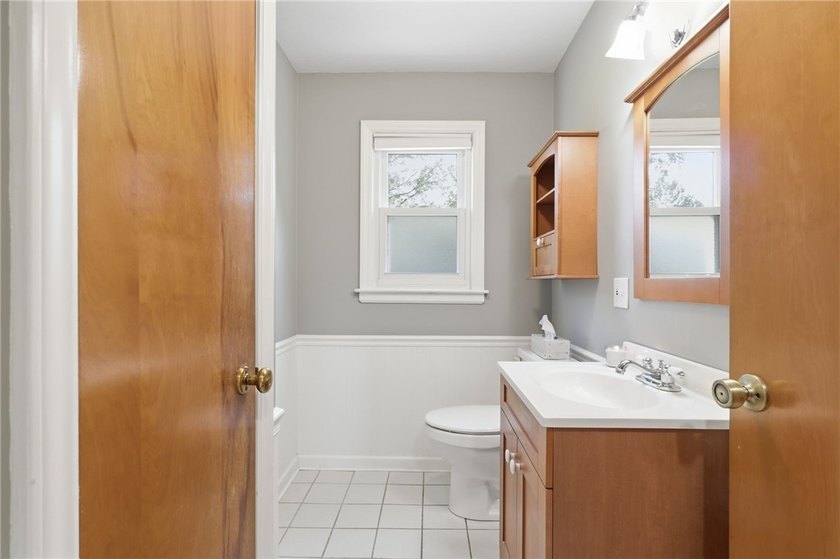 Welcome to this charming 4-bedroom 1.5 bath just yards away from - photo 25
