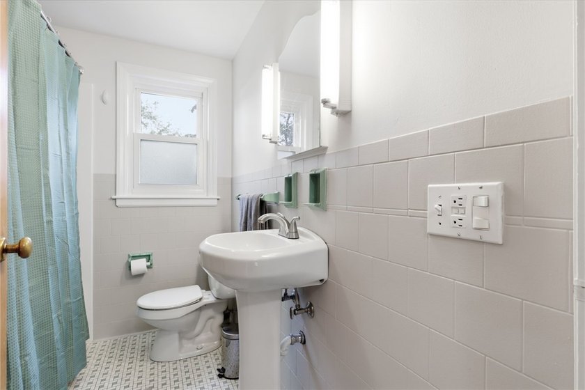 Welcome to this charming 4-bedroom 1.5 bath just yards away from - photo 27