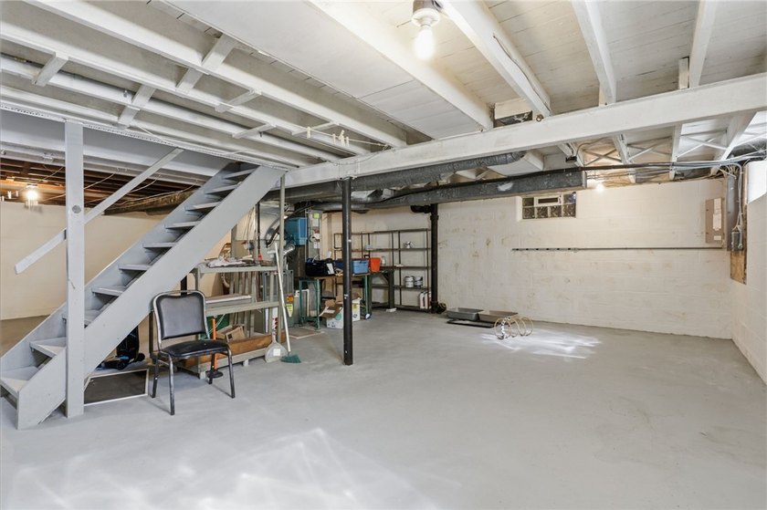Welcome to this charming 4-bedroom 1.5 bath just yards away from - photo 29