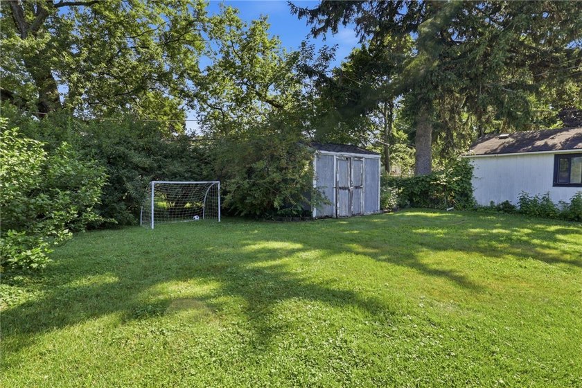 Welcome to this charming 4-bedroom 1.5 bath just yards away from - photo 31