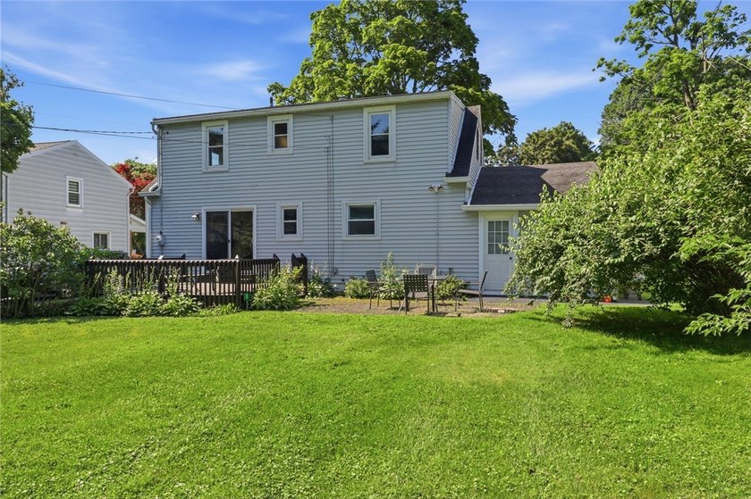 Welcome to this charming 4-bedroom 1.5 bath just yards away from - photo 33