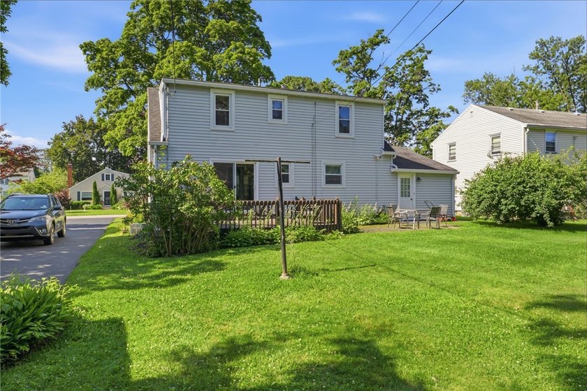Welcome to this charming 4-bedroom 1.5 bath just yards away from - photo 34