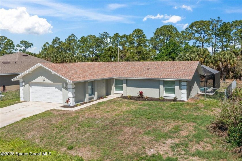 Brand New Roof! Welcome home to this beautifully renovated pool - photo 6