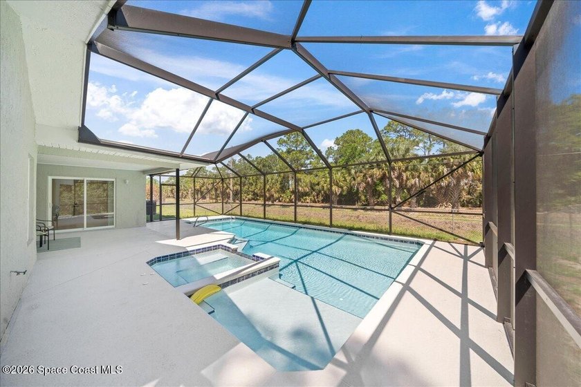 Brand New Roof! Welcome home to this beautifully renovated pool - photo 7