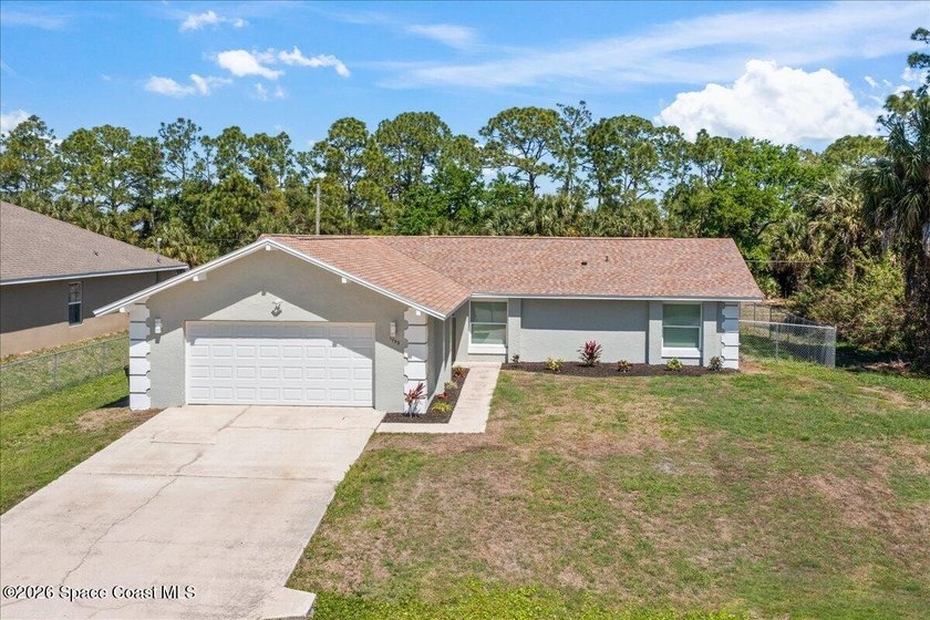 Brand New Roof! Welcome home to this beautifully renovated pool - photo 8