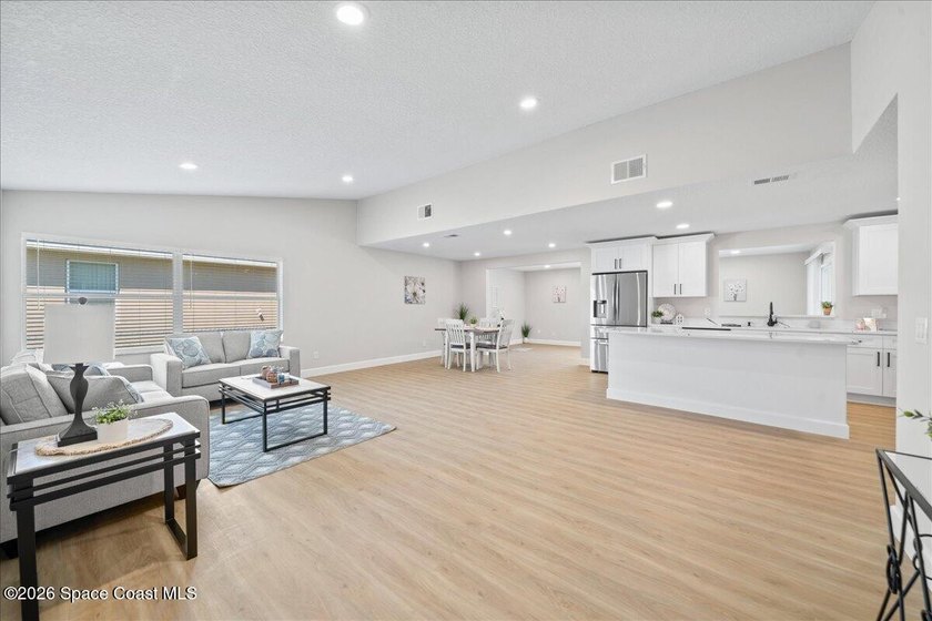 Brand New Roof! Welcome home to this beautifully renovated pool - photo 9