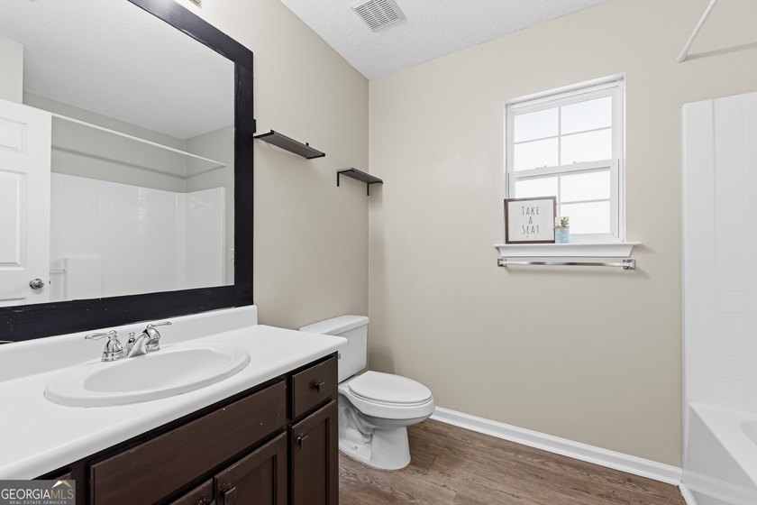 Welcome home to this sweet 3-bedroom, 2-bathroom home located in - photo 24