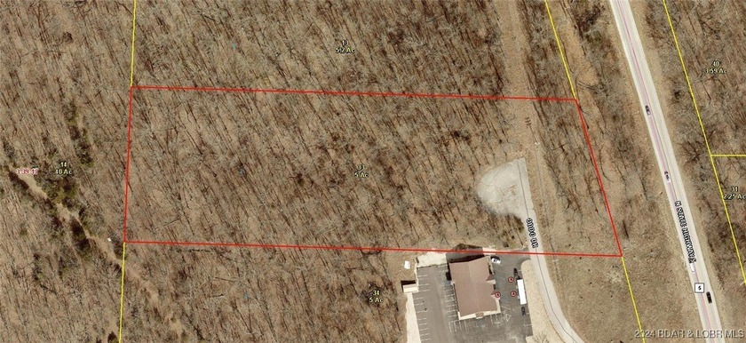 This expansive 5-acre commercial lot boasts exceptional frontage - photo 8