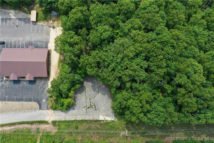 This expansive 5-acre commercial lot boasts exceptional frontage - photo 9