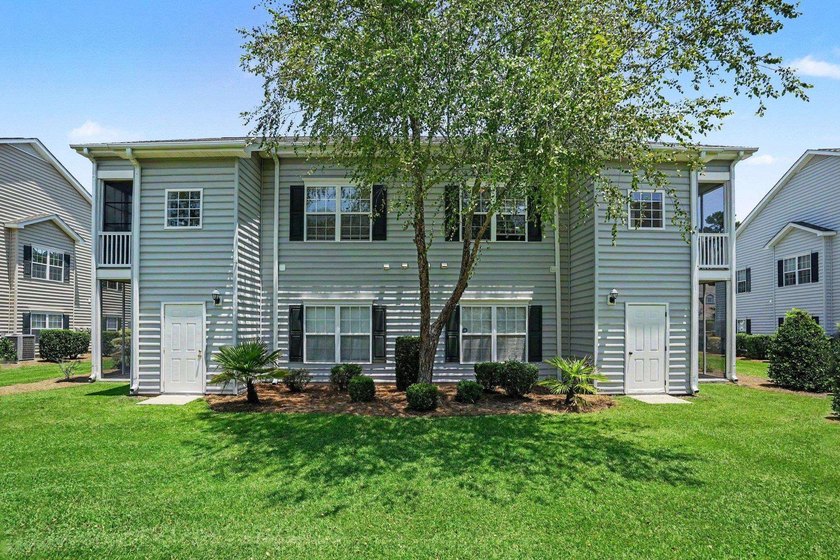 Welcome to this delightful three-bedroom, two-bathroom end unit - photo 28