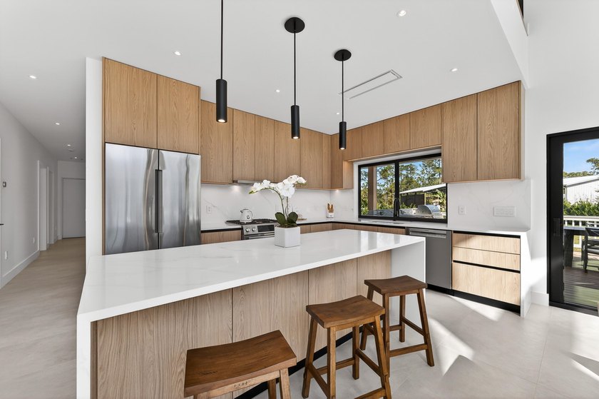 This exceptional new construction estate offers a refined blend - photo 11