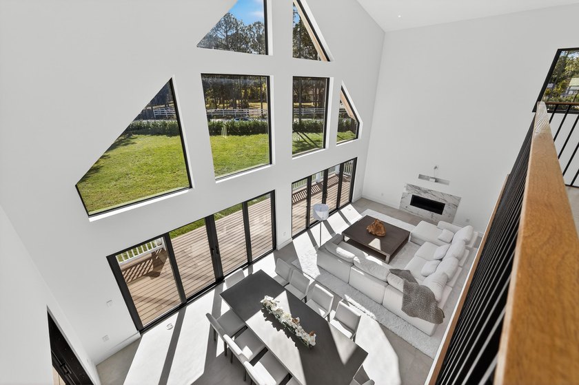 This exceptional new construction estate offers a refined blend - photo 13