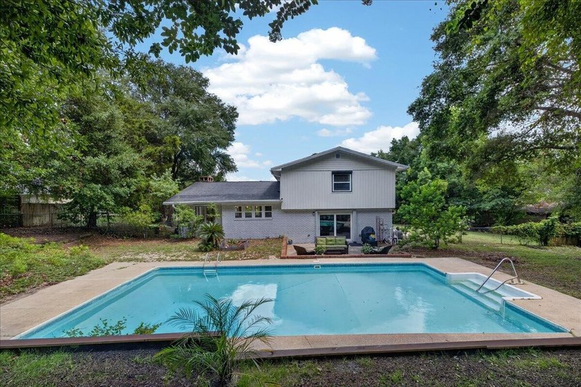 Nestled on a spacious double lot of just over half an acre, this - photo 43