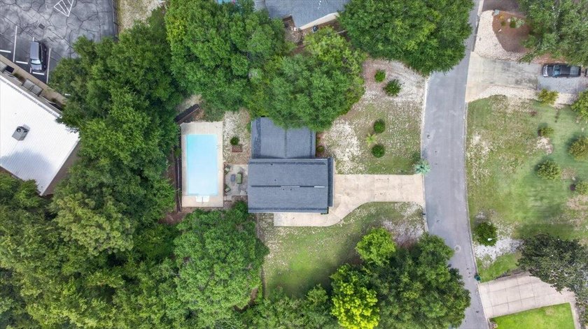 Nestled on a spacious double lot of just over half an acre, this - photo 44