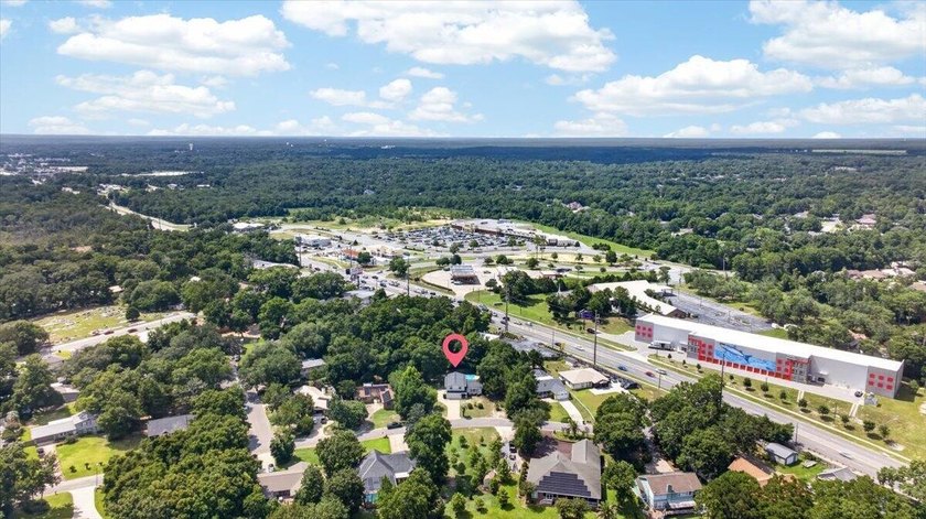 Nestled on a spacious double lot of just over half an acre, this - photo 46