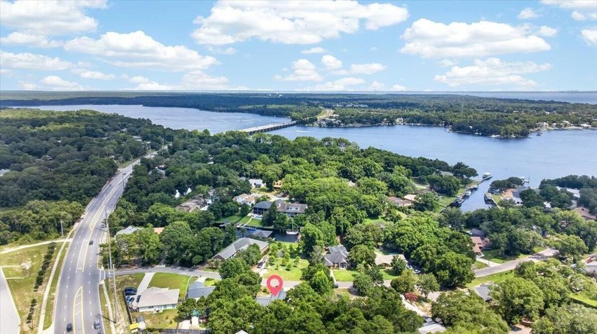 Nestled on a spacious double lot of just over half an acre, this - photo 48