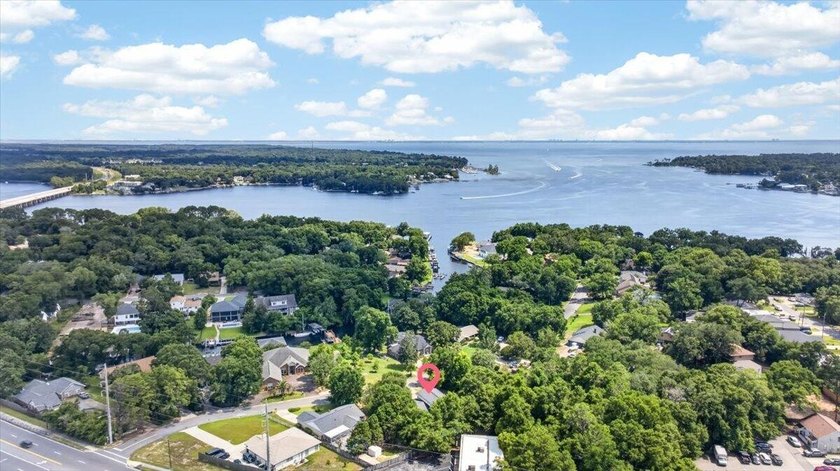 Nestled on a spacious double lot of just over half an acre, this - photo 49