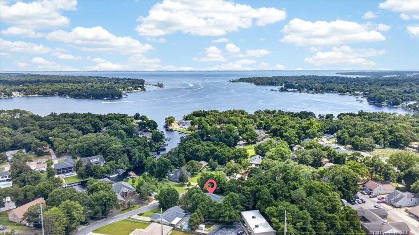 Nestled on a spacious double lot of just over half an acre, this - photo 50