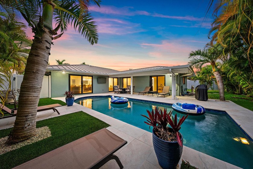 Experience refined coastal living in this beautifully renovated - photo 2