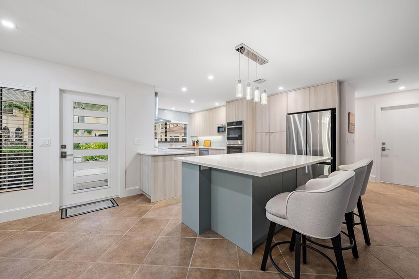 Experience refined coastal living in this beautifully renovated - photo 5