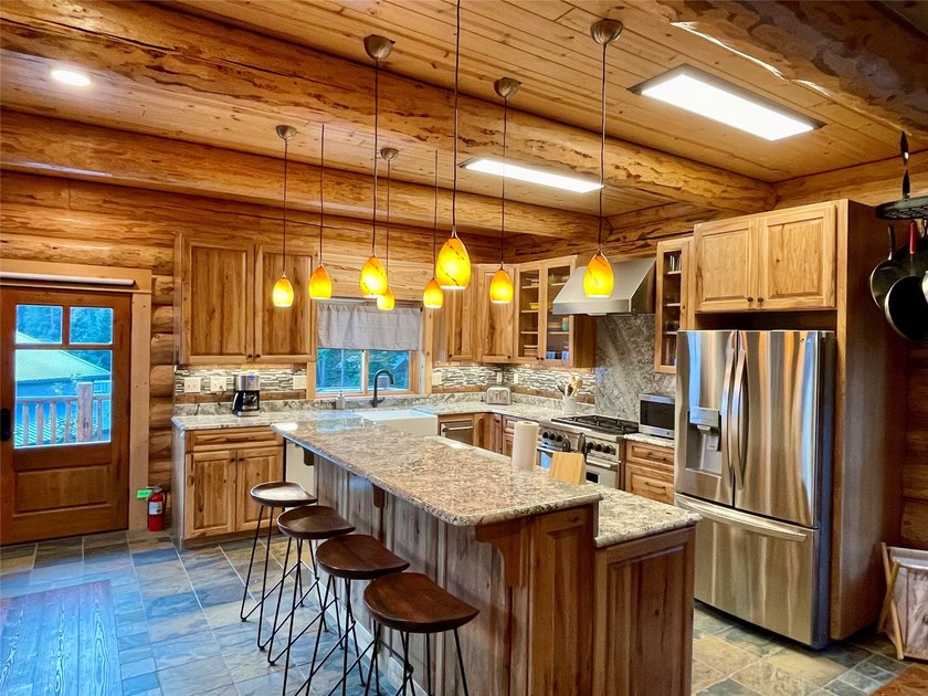 Capture the Montana dream with this stunning, hand-hewn log home - photo 10